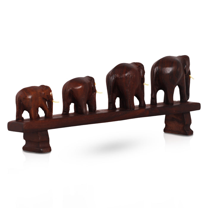 Handcrafted Rosewood Elephant Family Figurine – Four Elephants Crossing a Bridge | Kerala Traditional Decor