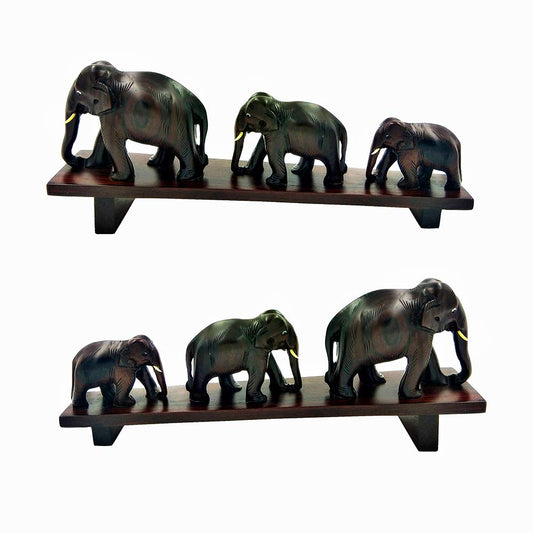 Handcrafted rosewood model of three elephants crossing a bridge ideal for home décor and gifting