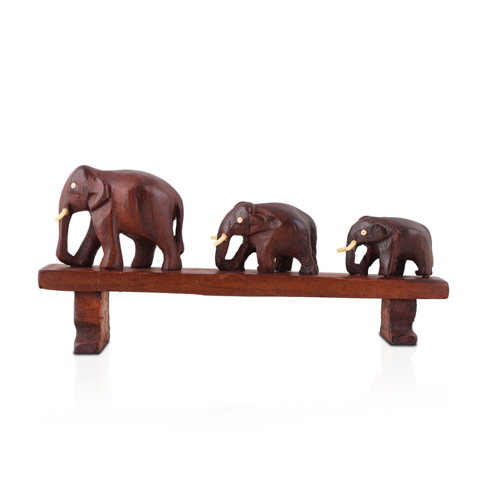 Handcrafted Rosewood Sculpture – Three Elephants Crossing a Bridge
