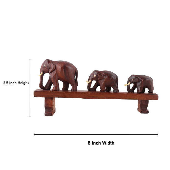 Handcrafted Rosewood Sculpture – Three Elephants Crossing a Bridge