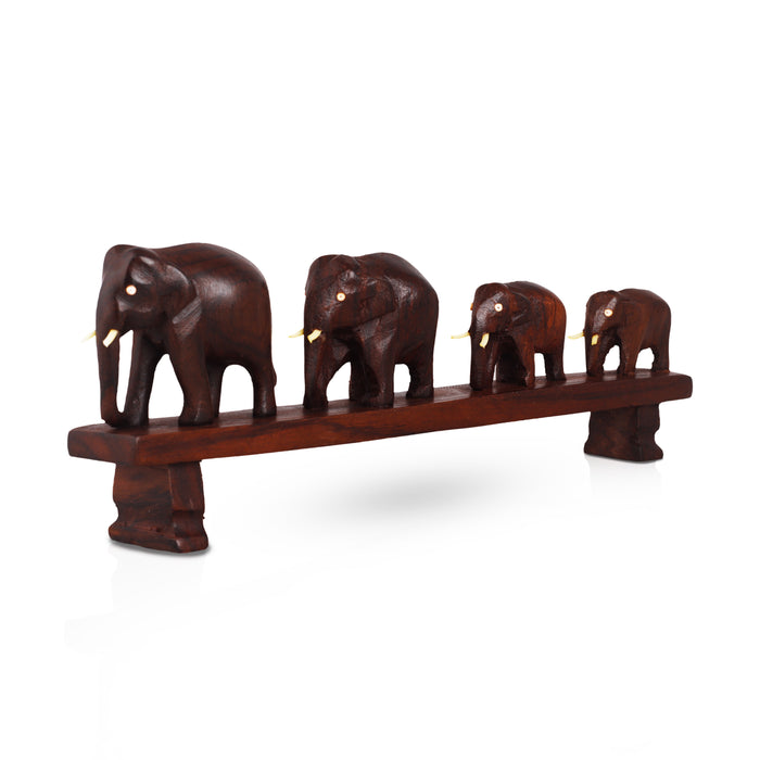 Handcrafted Rosewood Elephant Family Figurine – Four Elephants Crossing a Bridge | Kerala Traditional Decor
